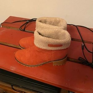 A pair of fur lined boots